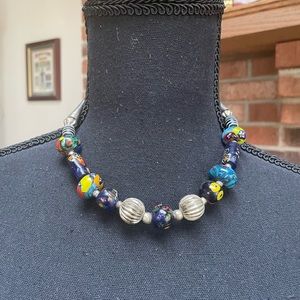 Multi-colored necklace with hook closure